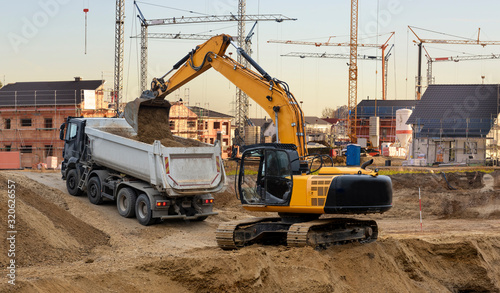 Fotografi excavator at work in construction site