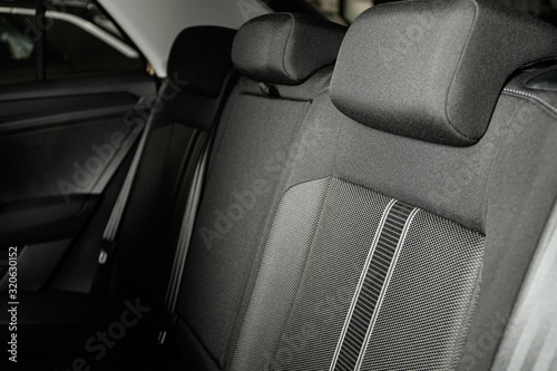 Modern car interior with comfortable grey seats © New Africa