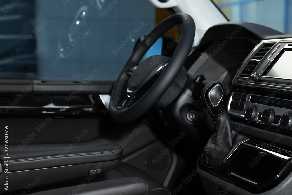 Gearshift and dashboard inside of modern car