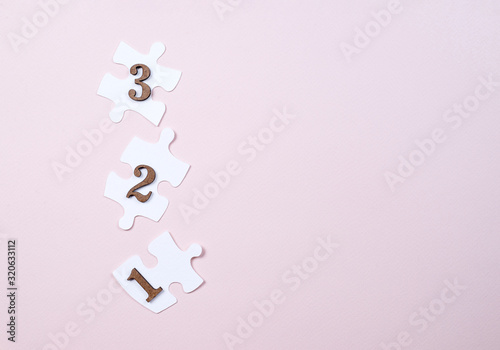 paper puzzles with numbers. Background for your recordings