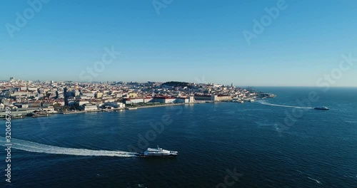 Wallpaper Mural Aerial view of the skyline of the city of Lisbon with the Comercio Square, the Alfama Neighbourhood and the Tagus River, in Portugal Torontodigital.ca