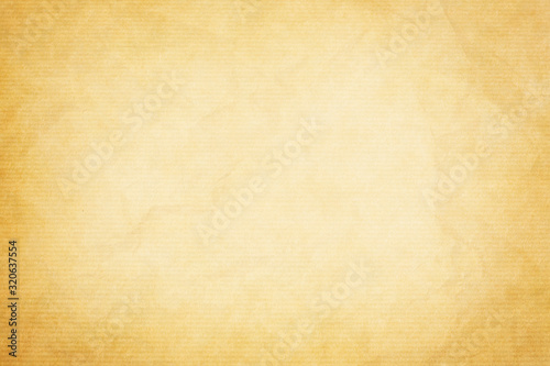 old crumpled craft paper texture or background with dark vignette borders