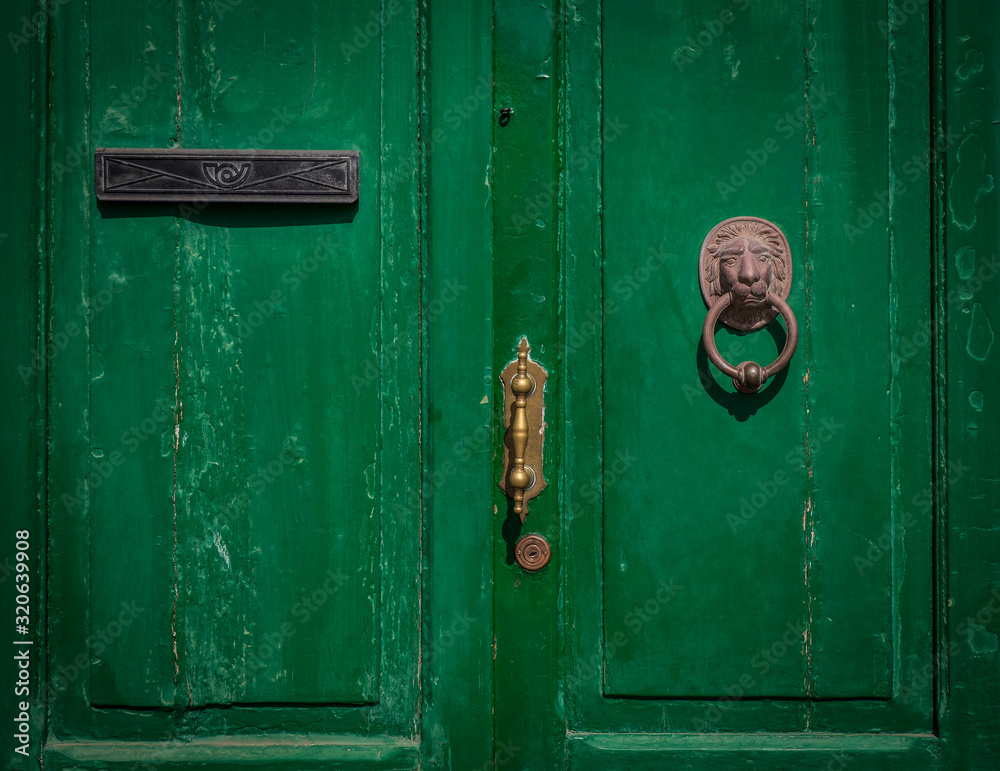 The old wooden door in city Teguise, Lanzarote The old wooden door in city Teguise, Lanzarote