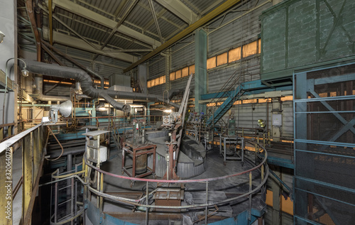 Photos The top of the cylindrical gas treatment reactor with a variety of equipment