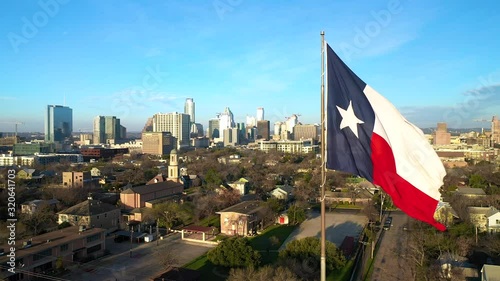 4K Aerial Drone Shot Austin Texas Skyline Texas State Flag Texas Capital photo