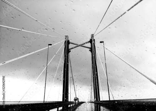 The Zárate - Brazo Largo bridge, Buenos Aires, Argentina. Pass a truck on a rainy day. photo