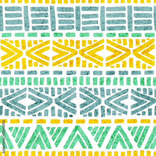 Seamless ethnic pattern. Summer print for textiles, swimsuit, yoga mat. Aztec and tribal motifs. Grunge texture. Vector illustration.