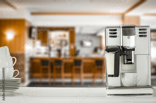 Fotografija White coffee machine and free space for your decoration