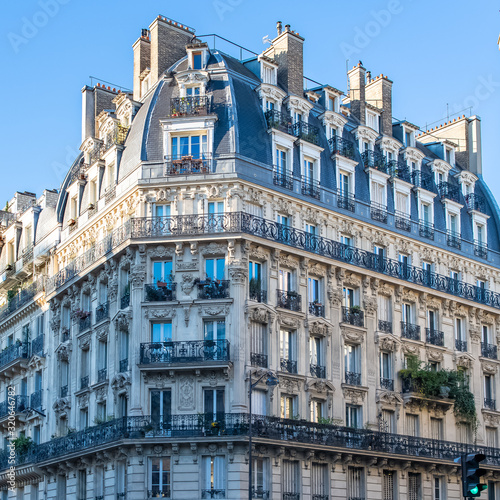 Paris, typical facade and windows, beautiful building rue des Archives