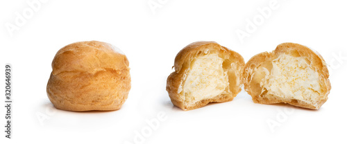 Photos Homemade profiteroles stuffed with whipping cream isolated on white