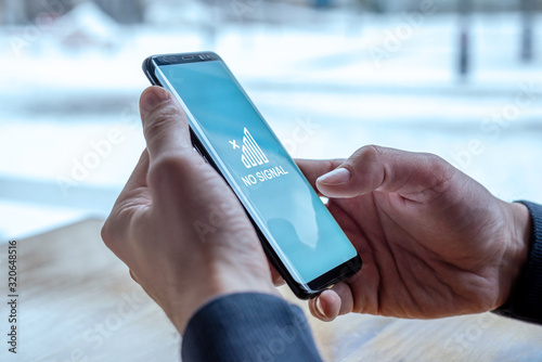 No mobile network signal concept message on mobile phone display