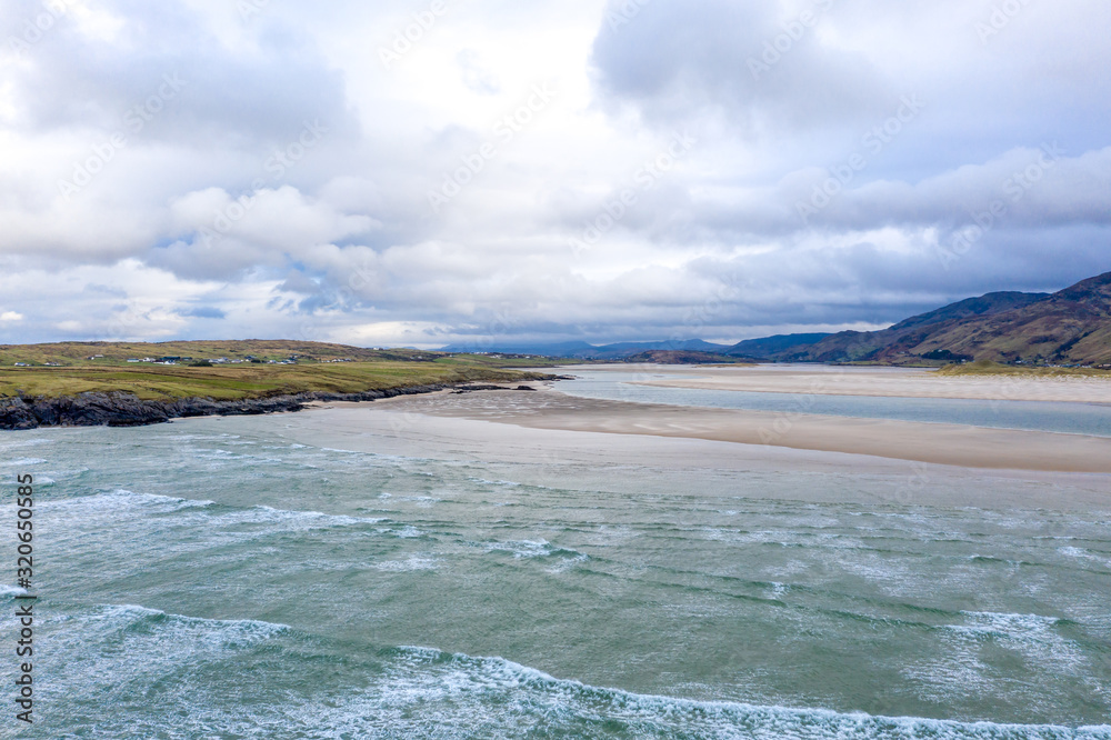 Aerial view of the beach and caves at Maghera Beach near Ardara, County Donegal - Ireland Aerial view of the beach and caves at Maghera Beach near Ardara, County Donegal - Ireland