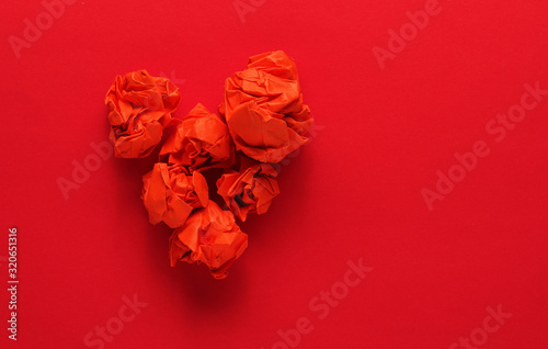 Red paper balls shaped as aheart photo