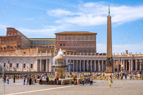 Rome, Italy - Panoramic view of the St. Peter’s Square - Piazza San Pietro - in Vatican City State, with the ancient Egyptian obelisk from Heliopolis and granite fountain