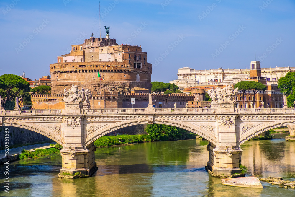 Rome, Italy - Panoramic view of Rome with Castle of St. Angel - Castel Sant’Angelo - and Ponte Vittorio Emanuele II bridge over the Tiber river