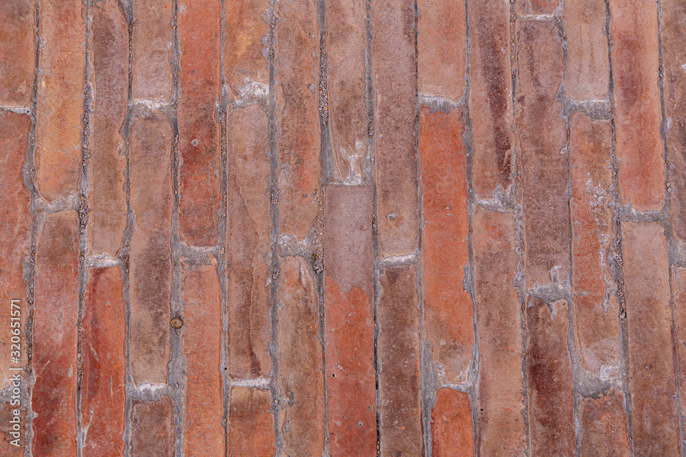 Newly laid red ground tile on a street