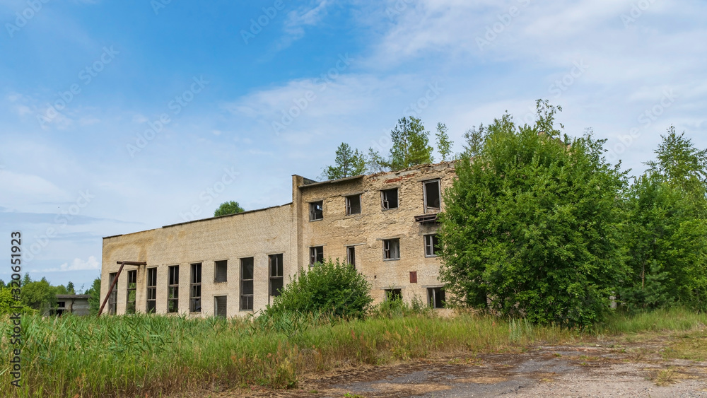 Abandoned building in the exclusion zone in Polessky radiation-ecological reserve in the village of Babichi. Ecological concept.