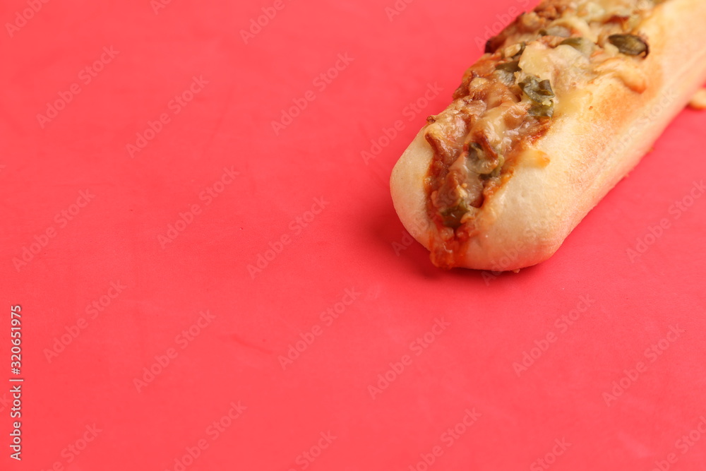 hot dog with cheese and pepper