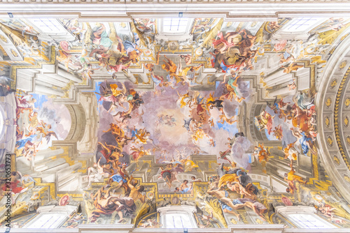 Picturesque painted ceiling of church of St. Ignatius of Loyola at Campus Martius photo
