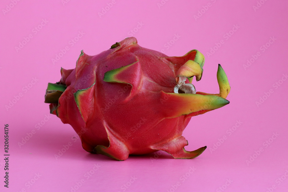 Dragon fruit isolated on pink background Dragon fruit isolated on pink background