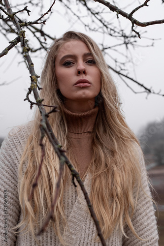 Girl with long hair for a walk in the fall