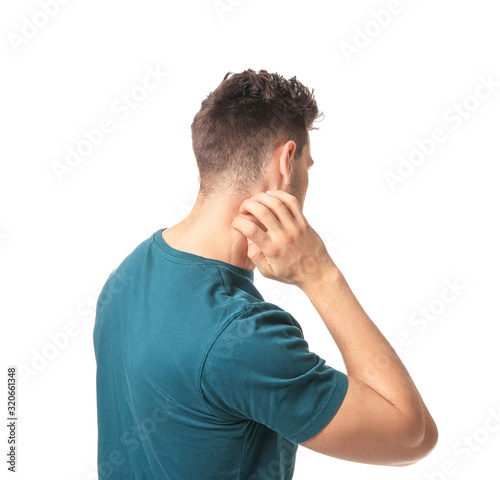 Scratching allergic man on ...