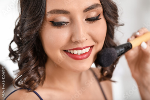 Makeup artist working with ...