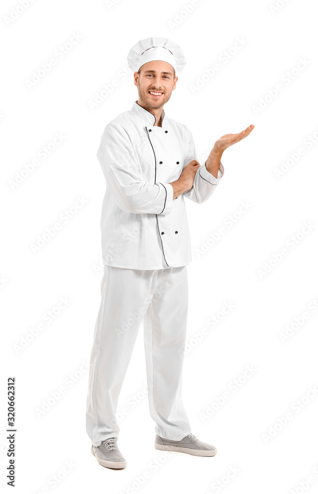 Handsome male chef showing something on white background Handsome male chef showing something on white background