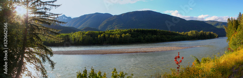 Beautiful day: Wonderful panoramic view of Skeena River in British Columbia / Canada photo