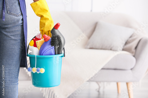 Janitor with set of cleanin...