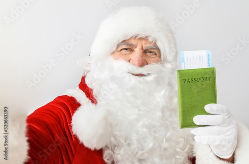 Santa claus holding green p...