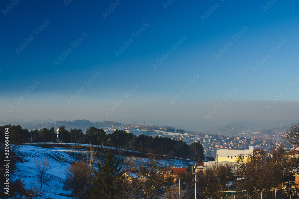 Air pollution above the city in winter
