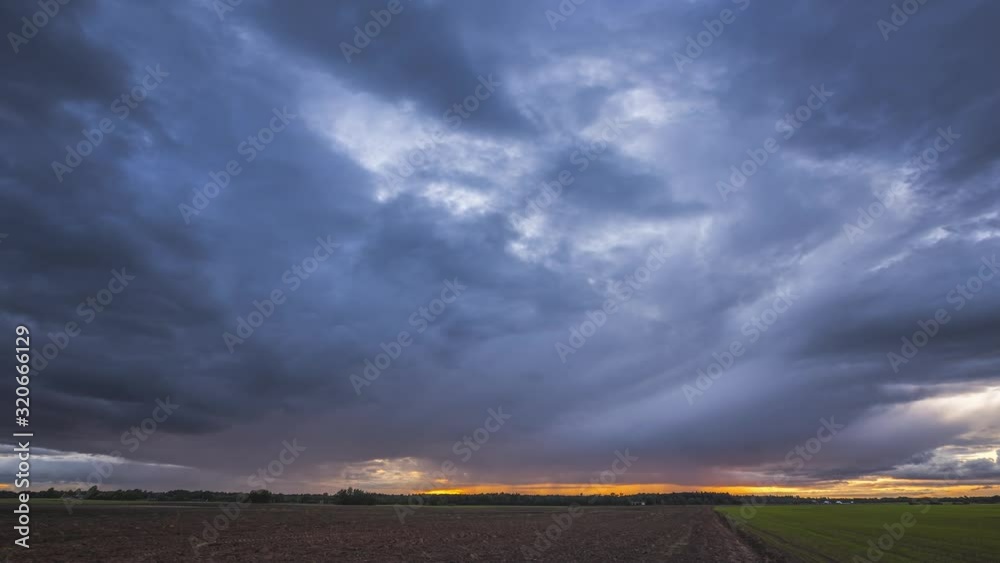 Dramatic colorful timelapse of sunset light in the evening