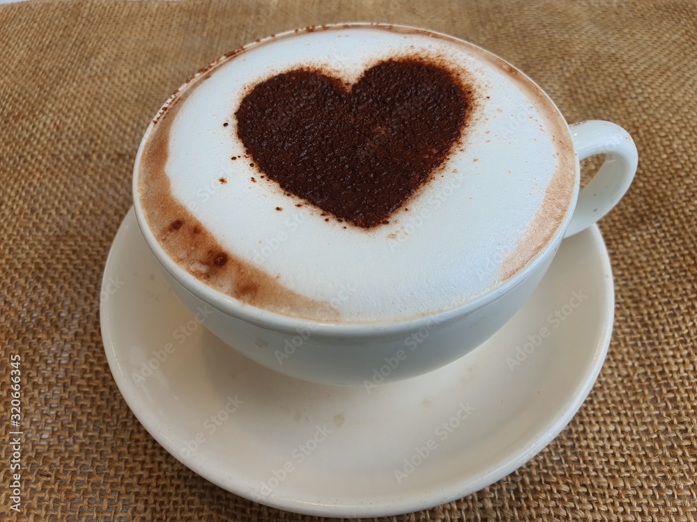 Obraz premium a cup of hot cappucino