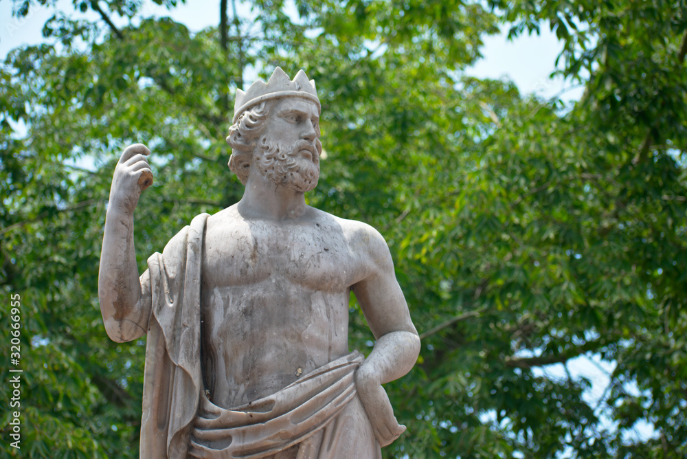 Statue of a king man forward in a park in Barranco Miraflores Lima Peru