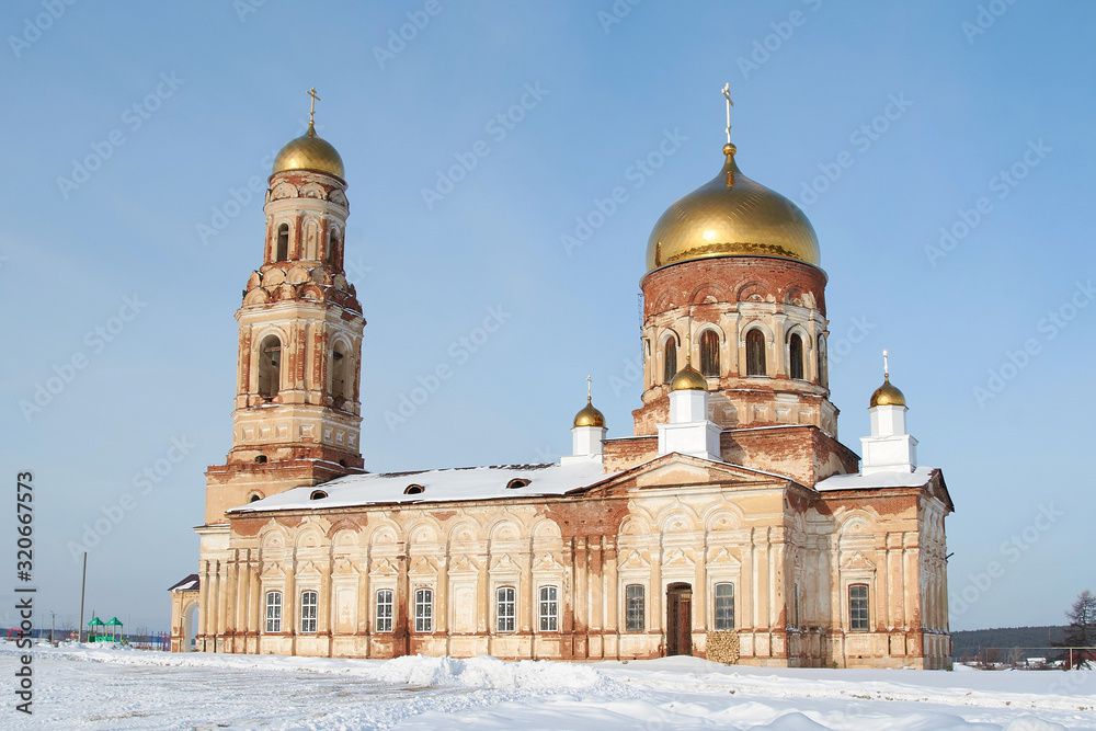 old Russian Church on a winter background