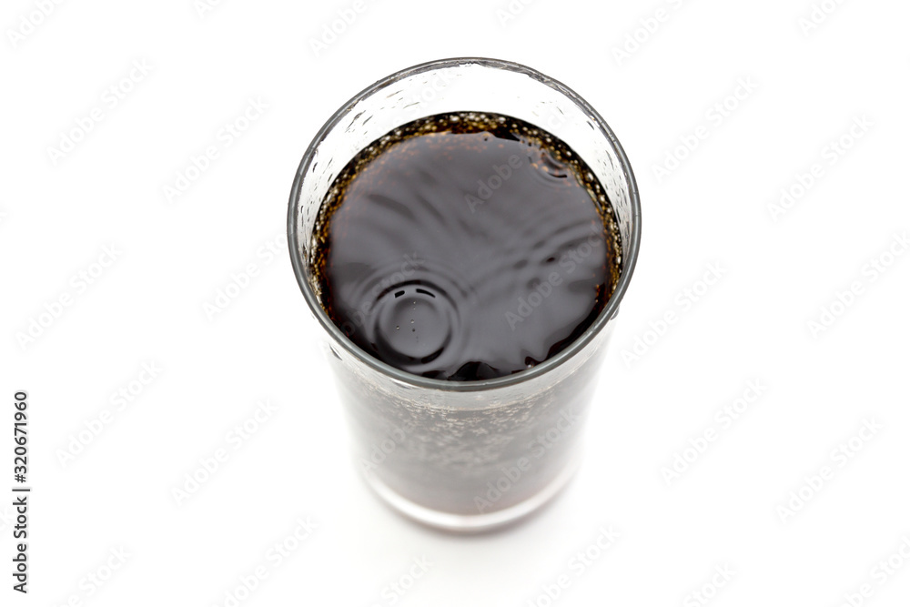 glass with drink isolated on a white background, top view. glass with drink isolated on a white background, top view.