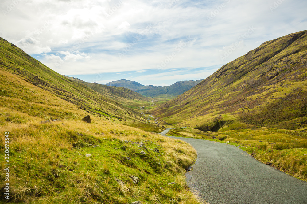 Scafell Pike over forest in the English Lake District Scafell Pike over forest in the English Lake District