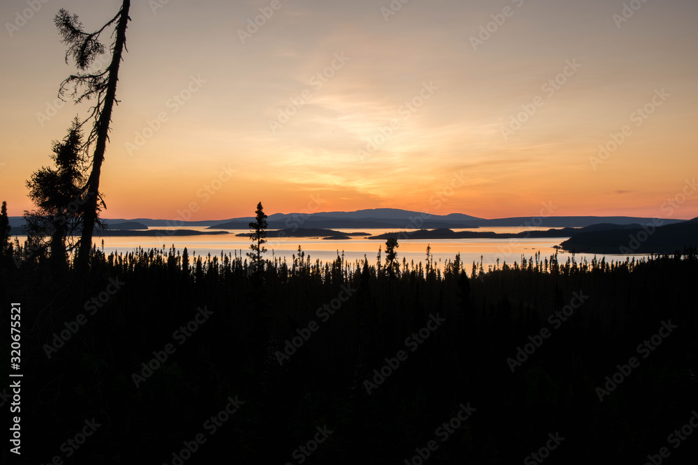 landscape of a sunset. Lake Manicouagan in Quebec. Mountain landscape with lake