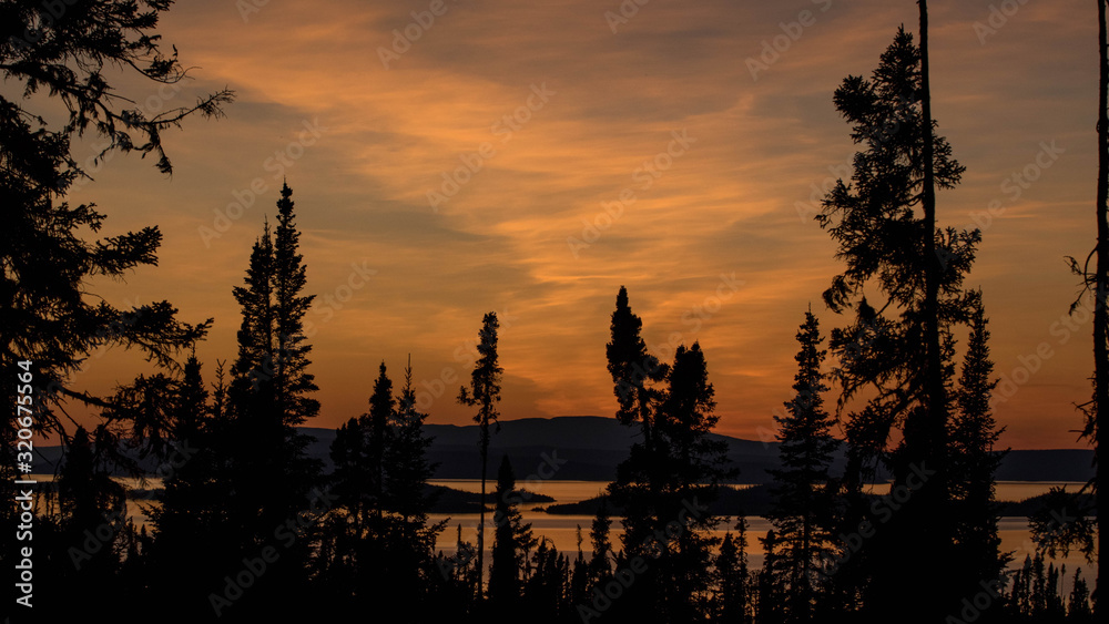 landscape of a sunset. Lake Manicouagan in Quebec. Mountain landscape with lake