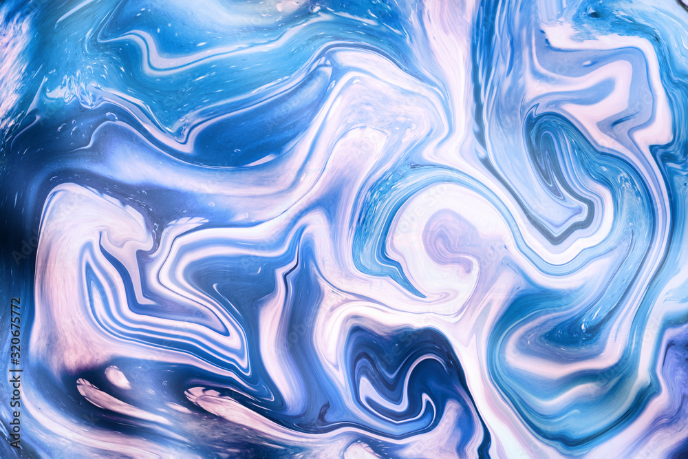 Beautiful, abstract ocean artistic marble background in various colors with swirls and ripples.