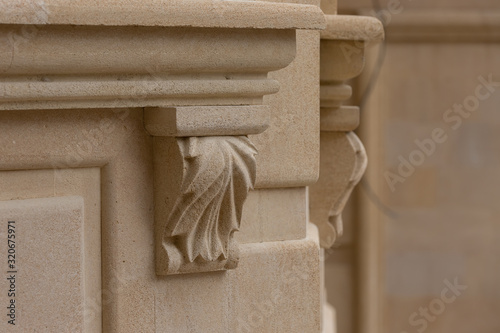 Bracket stone. Elements of architectural decorations of buildings.