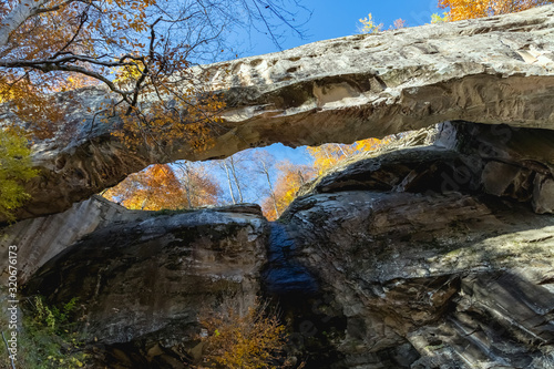 Hanging rock in the mountains. Autumn photo of nature.
