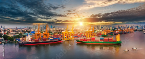 Aerial view of cargo ship, cargo container in warehouse harbor at thailand, container ship in import export and business logistic with panoramic view