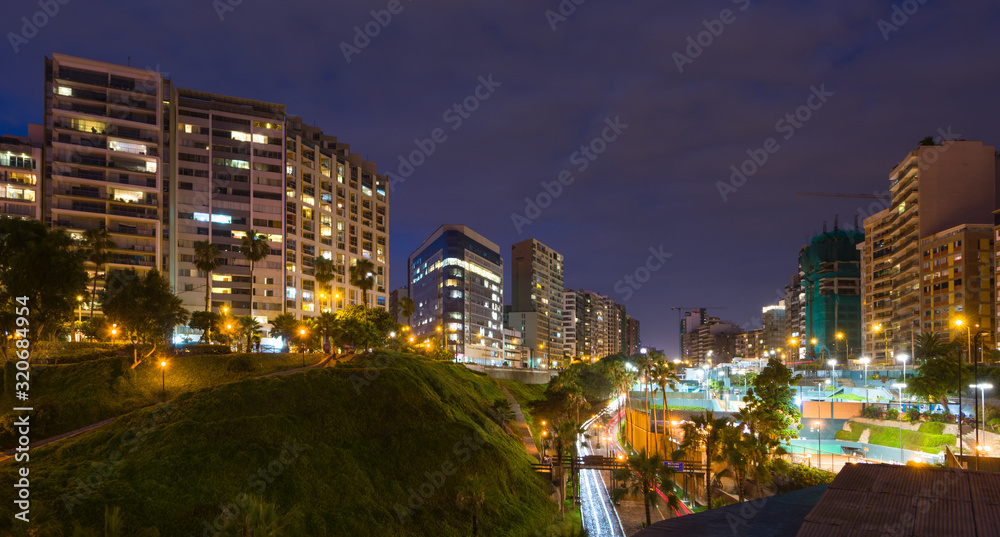 Skyline of Miraflores at night, in Lima, Peru