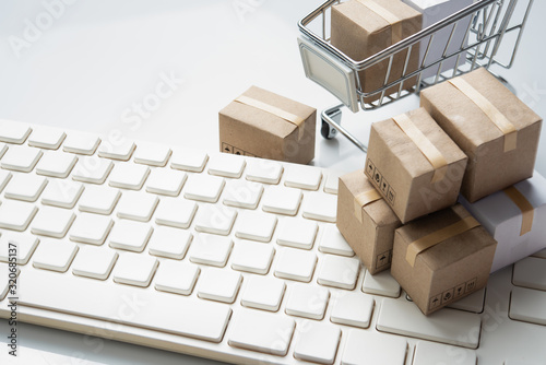 Shopping online  delivery and logistics concept Brown paper boxs on keyboard