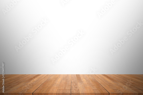 Wood table top isolated on white background. Used for product placement or montage. 