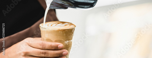 Canvas Print Professional barista making latte art coffee