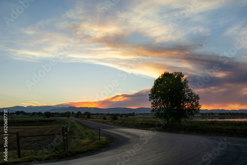 Smoky Sunset Mountain with Road and Tree © Rebecca Turner