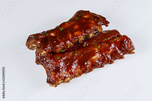 Hickory smoked beef ribs on isolated white background.